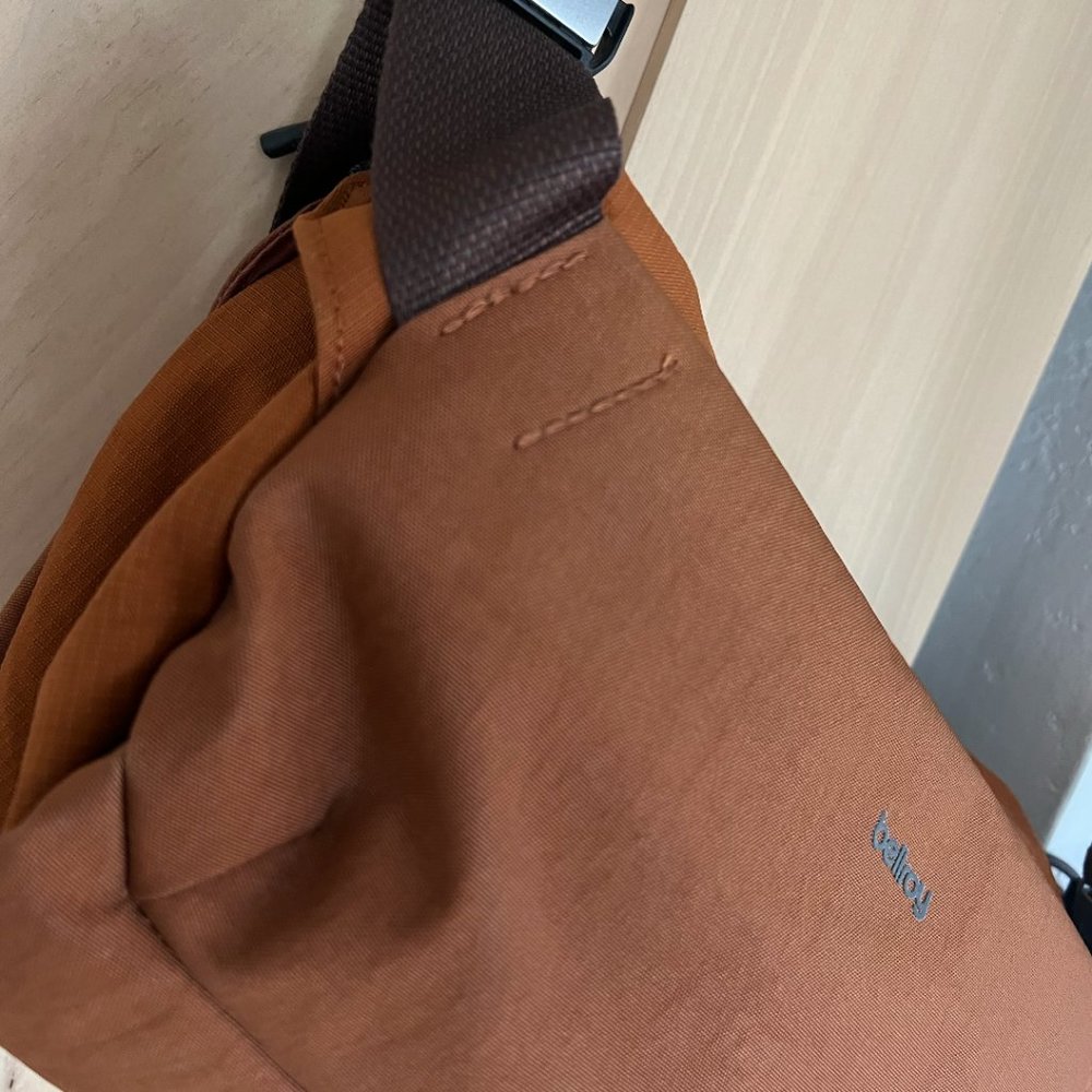 NWOT Bellroy Venture Sling Crossbody bag in bronze / orange